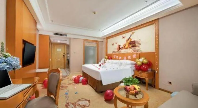 Bed in Vienna Hotel Nanning Anji Wanda 33rd Middle School Metro Station