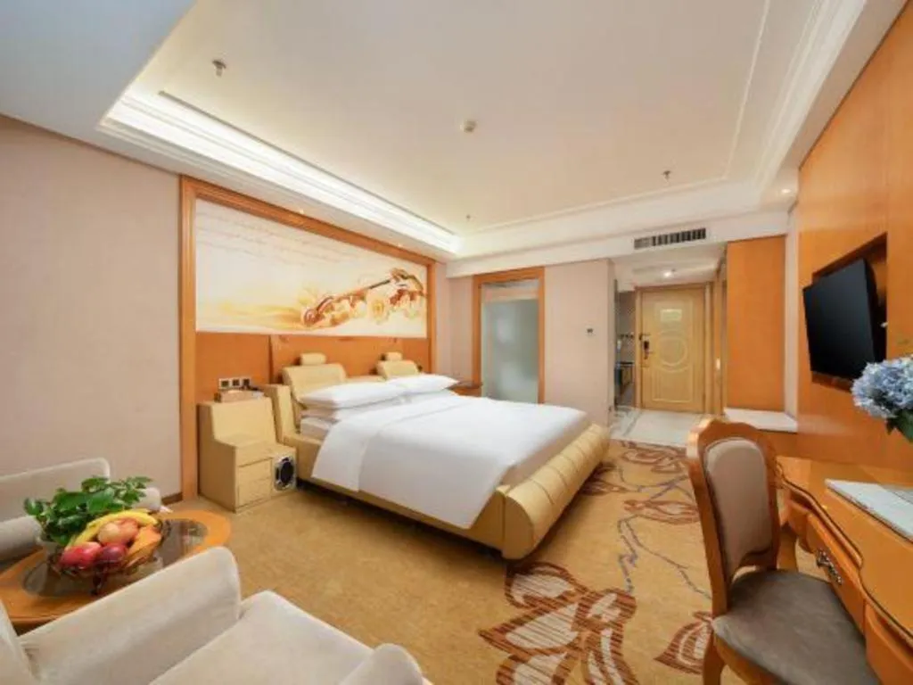 Bed in Vienna Hotel Nanning Anji Wanda 33rd Middle School Metro Station