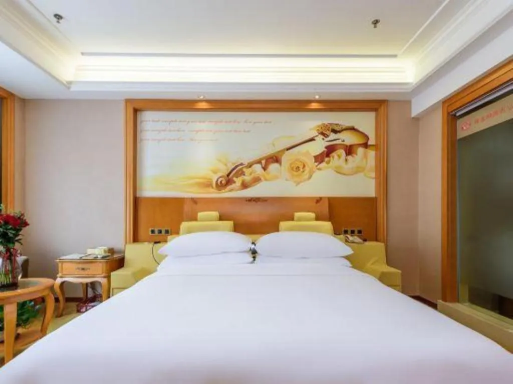 Bed in Vienna Hotel Nanning Anji Wanda 33rd Middle School Metro Station