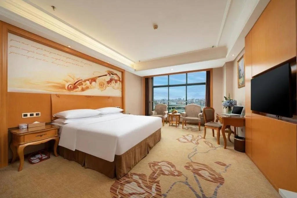 Bed in Vienna Hotel Nanning Anji Wanda 33rd Middle School Metro Station