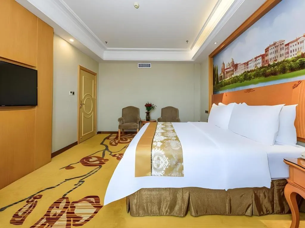 Bed in Vienna Hotel Nanning Anji Wanda 33rd Middle School Metro Station