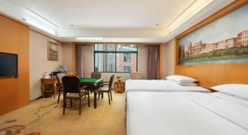 Bed in Vienna Hotel Nanning Anji Wanda 33rd Middle School Metro Station