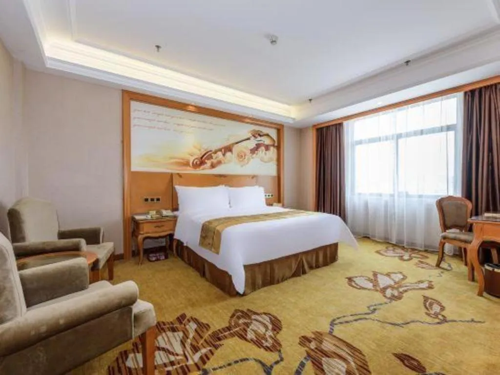 Bed in Vienna Hotel Nanning Anji Wanda 33rd Middle School Metro Station