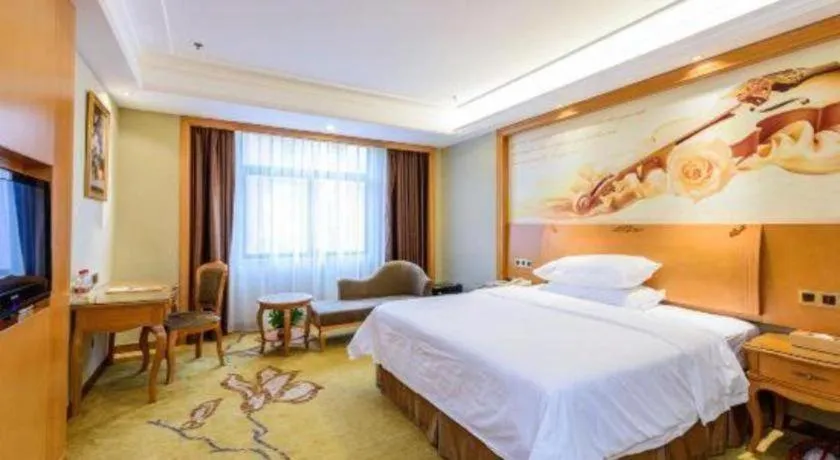 Bed in Vienna Hotel Nanning Anji Wanda 33rd Middle School Metro Station