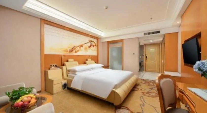 Bed in Vienna Hotel Nanning Anji Wanda 33rd Middle School Metro Station