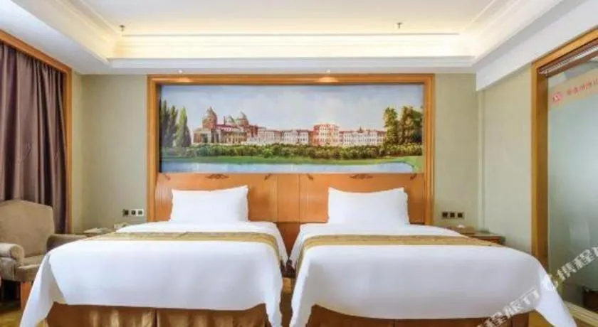 Bed in Vienna Hotel Nanning Anji Wanda 33rd Middle School Metro Station