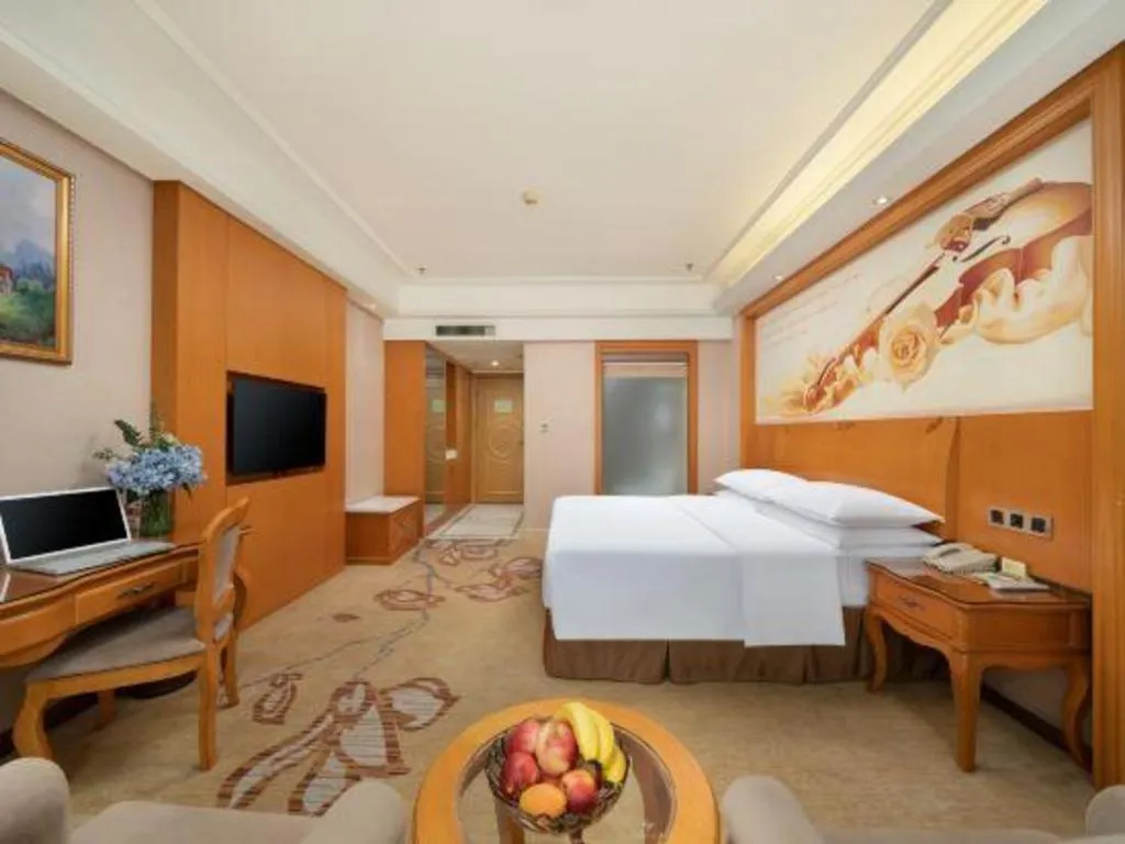 Bed in Vienna Hotel Nanning Anji Wanda 33rd Middle School Metro Station