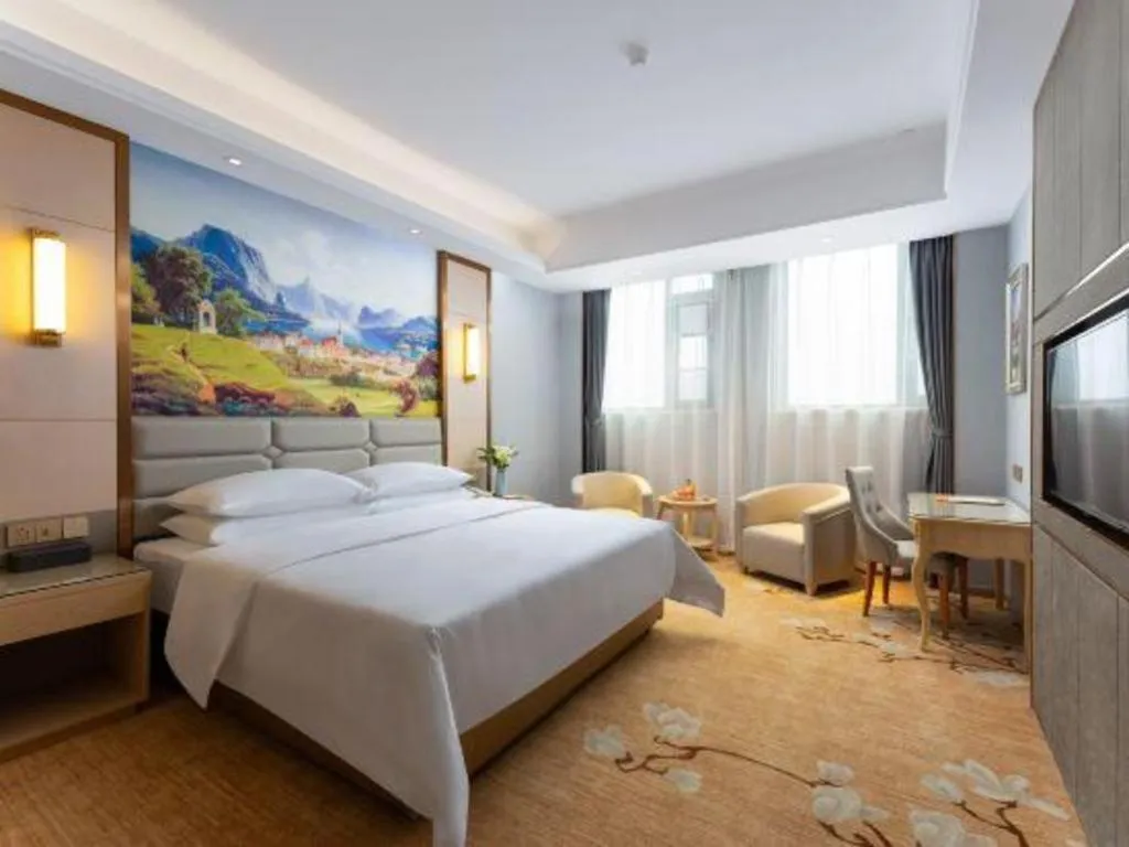 Bed in Vienna Hotel Wuhan Guobo Jiangang Metro Station