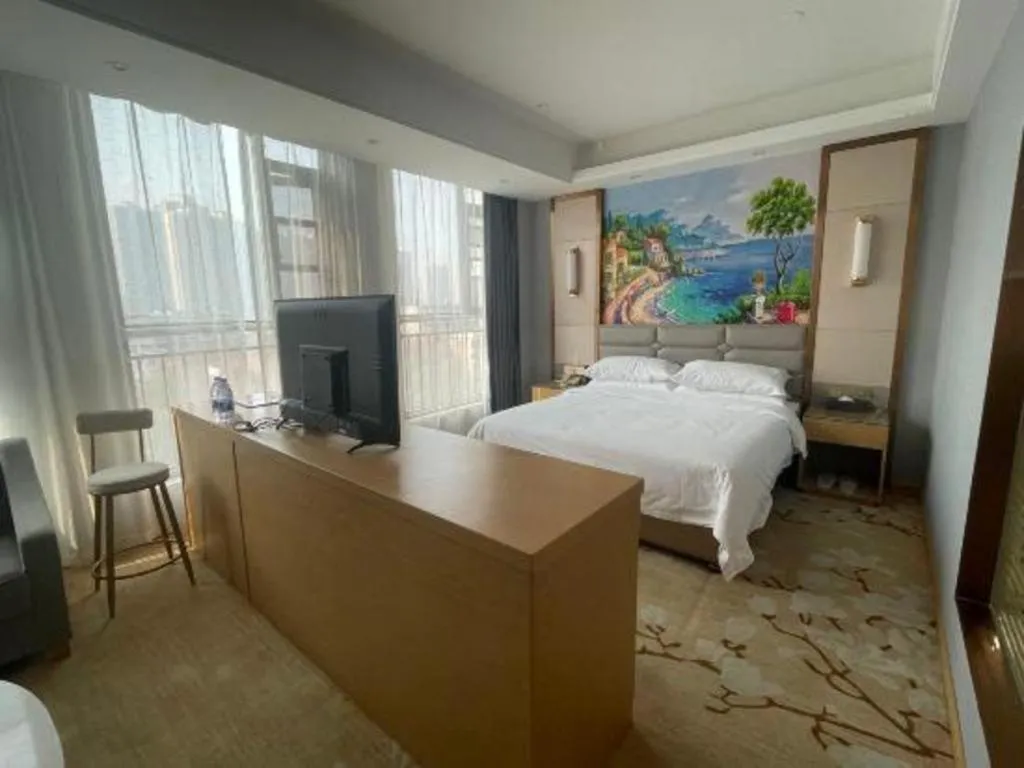 Bed in Vienna Hotel Wuhan Guobo Jiangang Metro Station