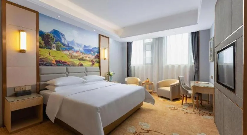 Bed in Vienna Hotel Wuhan Guobo Jiangang Metro Station