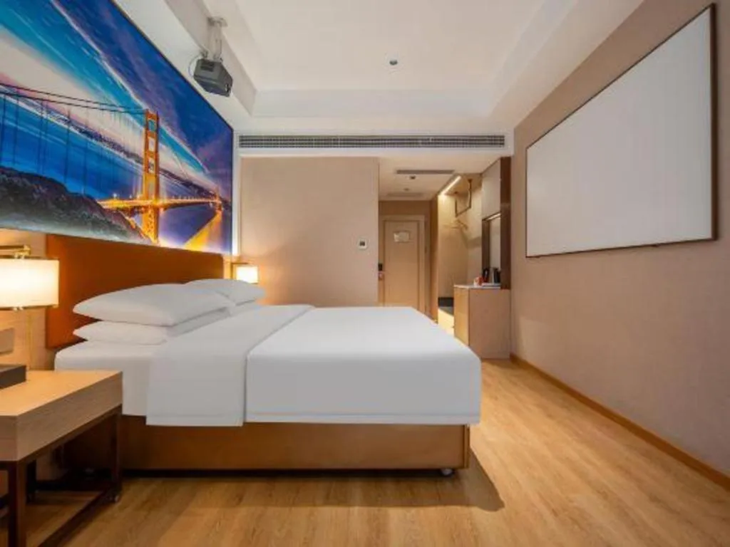 Bed in Vienna Hotel Wuhan Guobo Jiangang Metro Station