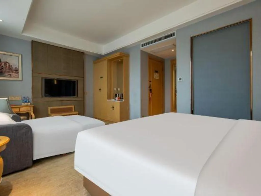 Bed in Vienna Hotel Wuhan Guobo Jiangang Metro Station