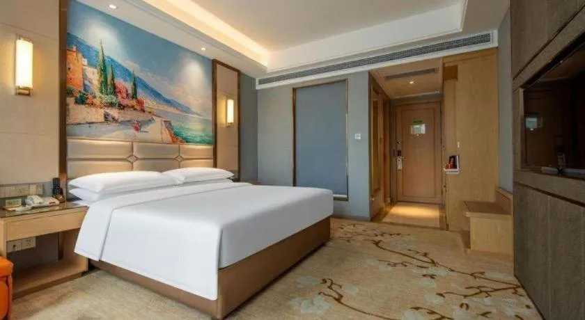 Bed in Vienna Hotel Wuhan Guobo Jiangang Metro Station