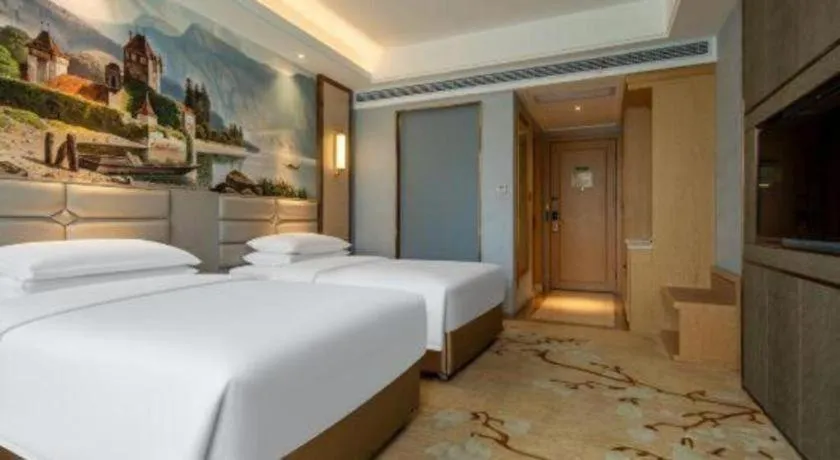 Bed in Vienna Hotel Wuhan Guobo Jiangang Metro Station