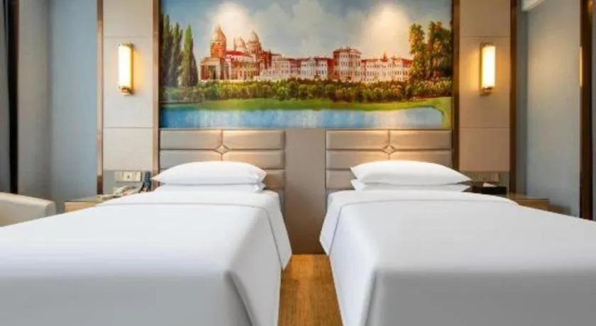 Bed in Vienna Hotel Wuhan Guobo Jiangang Metro Station