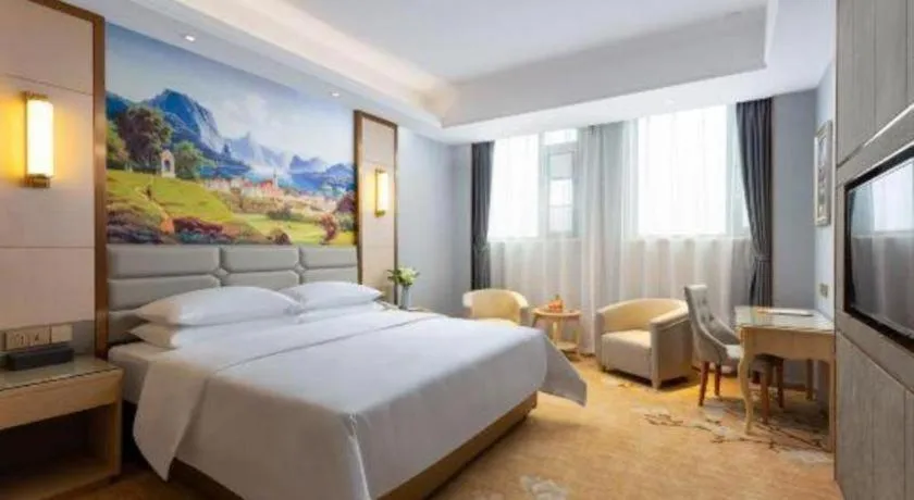 Bed in Vienna Hotel Wuhan Guobo Jiangang Metro Station