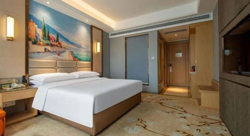 Bed in Vienna Hotel Wuhan Guobo Jiangang Metro Station