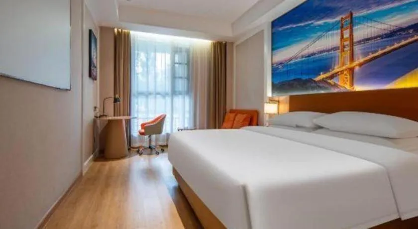 Bed in Vienna Hotel Wuhan Guobo Jiangang Metro Station