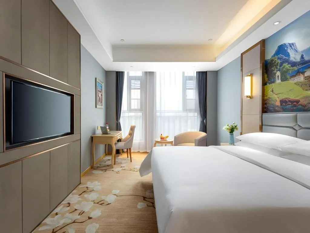 Bed in Vienna Hotel Wuhan Guobo Jiangang Metro Station