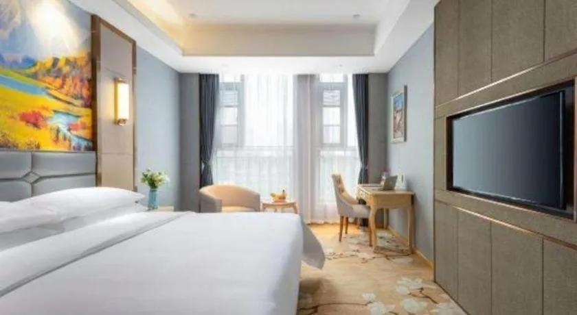 Bed in Vienna Hotel Wuhan Guobo Jiangang Metro Station