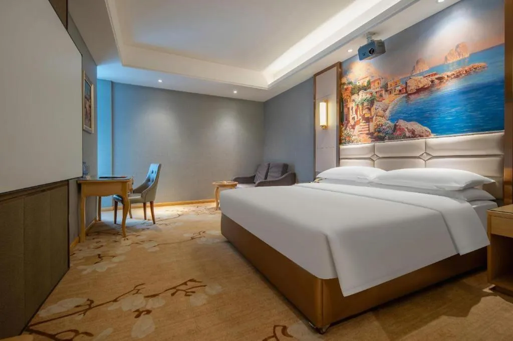 Bed in Vienna Hotel Wuhan Guobo Jiangang Metro Station