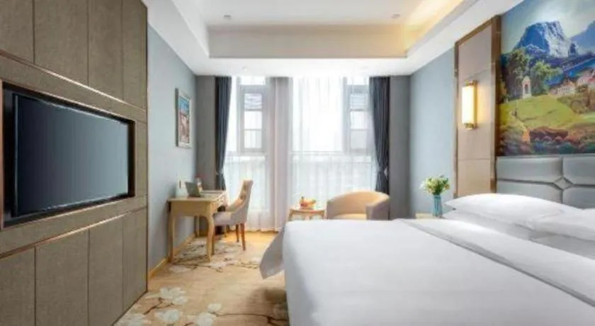 Bed in Vienna Hotel Wuhan Guobo Jiangang Metro Station