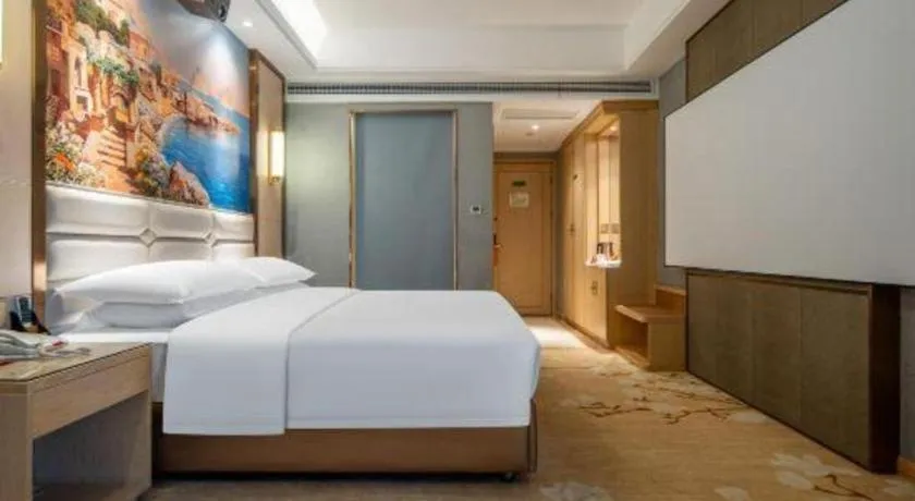 Bed in Vienna Hotel Wuhan Guobo Jiangang Metro Station