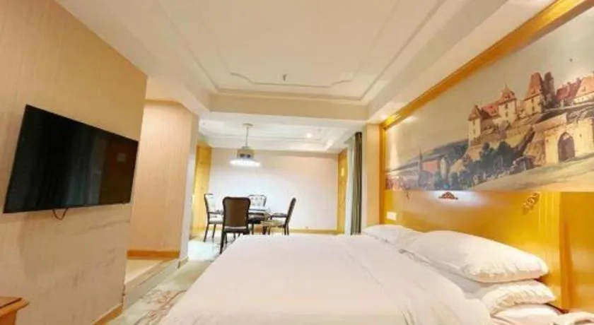 Bed in Vienna Hotel Chongqing Wanzhou Wanda Plaza