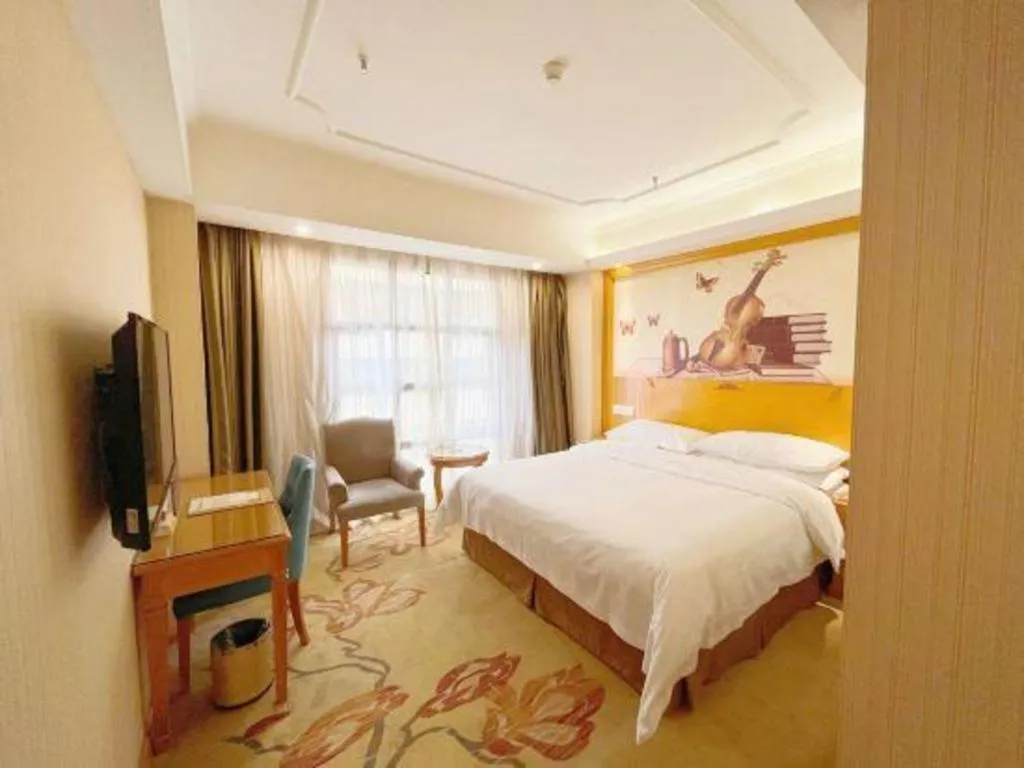 Bed in Vienna Hotel Chongqing Wanzhou Wanda Plaza
