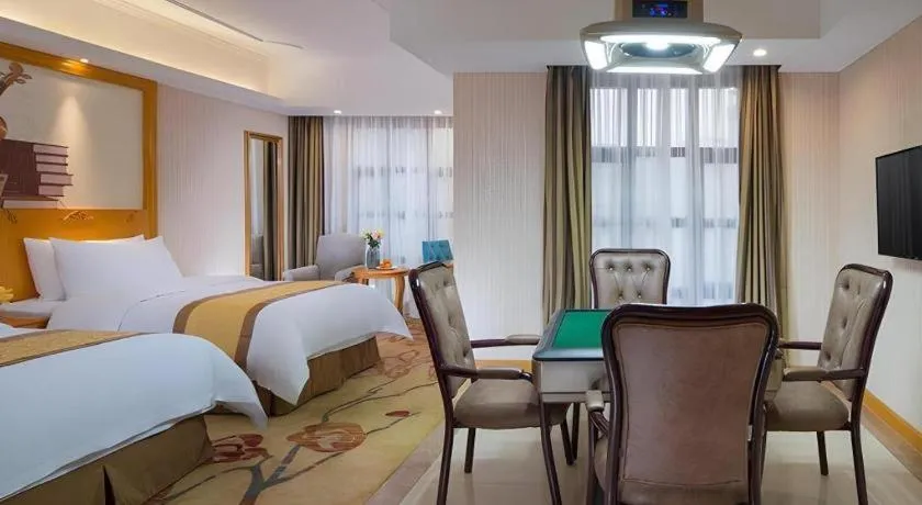 Bed in Vienna Hotel Chongqing Wanzhou Wanda Plaza