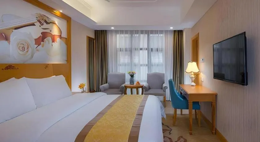 Bed in Vienna Hotel Chongqing Wanzhou Wanda Plaza