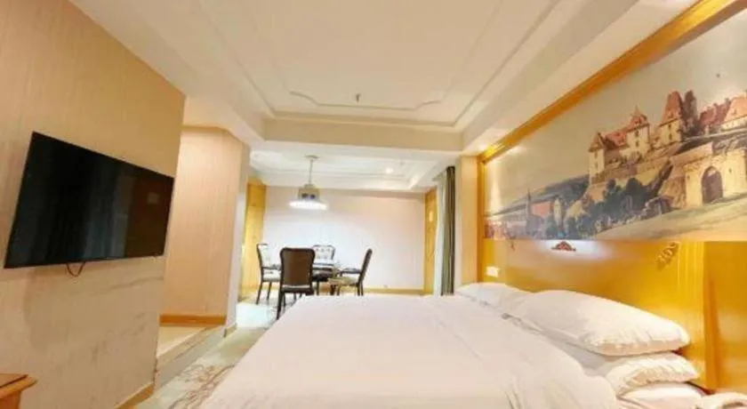 Bed in Vienna Hotel Chongqing Wanzhou Wanda Plaza