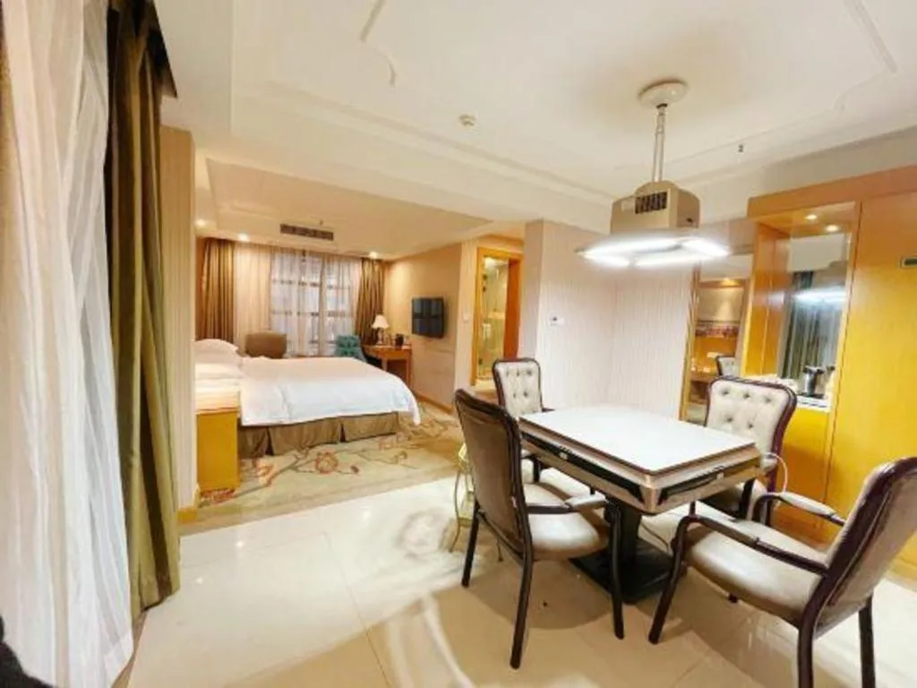 Bed in Vienna Hotel Chongqing Wanzhou Wanda Plaza