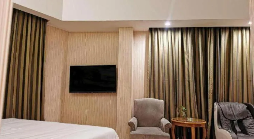 Bed in Vienna Hotel Chongqing Wanzhou Wanda Plaza