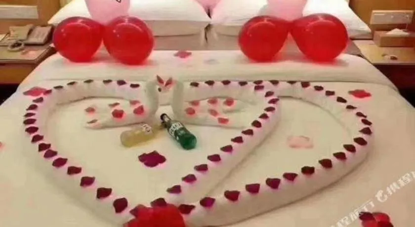 Bed in Vienna Hotel Chongqing Wanzhou Wanda Plaza