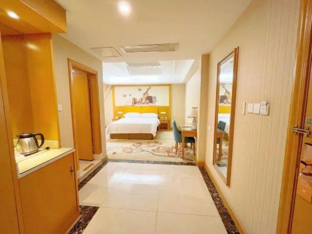 Bed in Vienna Hotel Chongqing Wanzhou Wanda Plaza