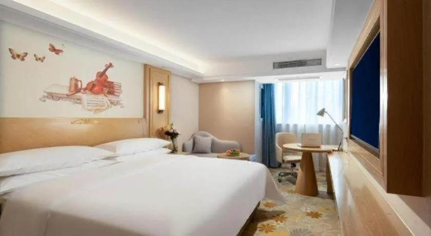 Bed in Vienna Hotel Chongqing Lijiatuo Pedestrian Street