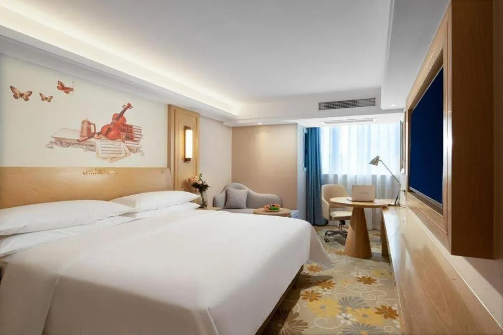 Bed in Vienna Hotel Chongqing Lijiatuo Pedestrian Street