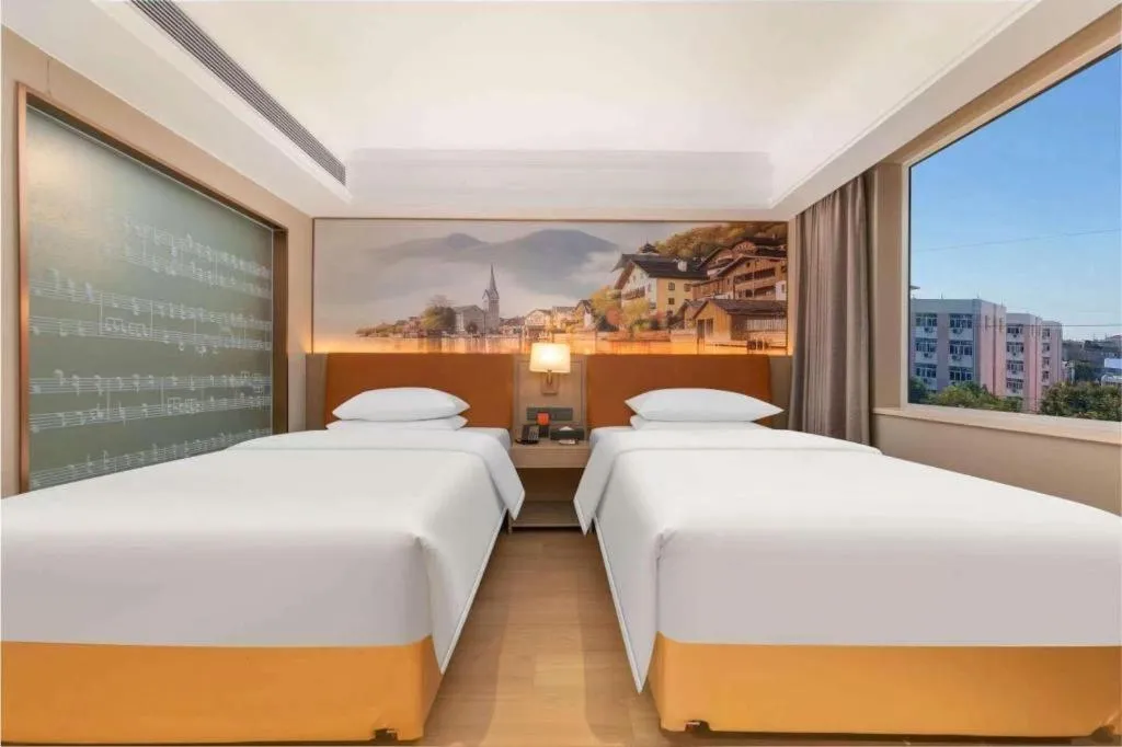 Bed in Vienna Hotel Hubei Jinzhou Changjiang University