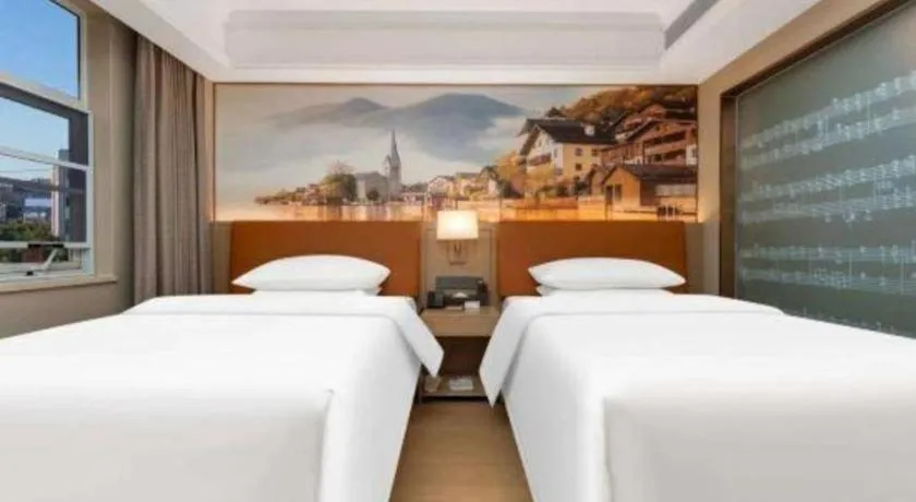 Bed in Vienna Hotel Hubei Jinzhou Changjiang University