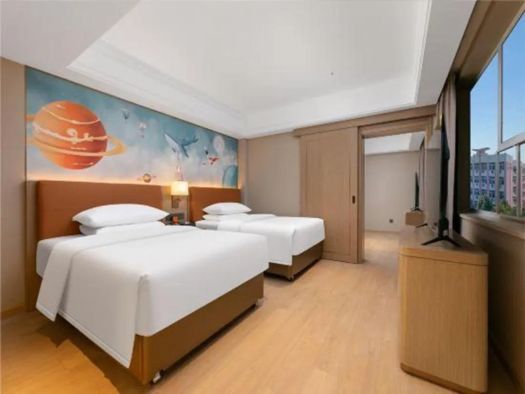 Bed in Vienna Hotel Hubei Jinzhou Changjiang University