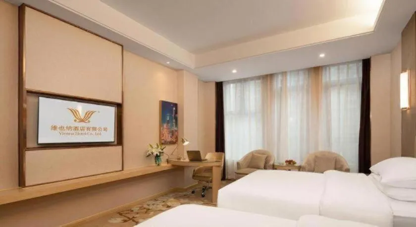 Bed in Vienna Hotel Chongqing Fengdu