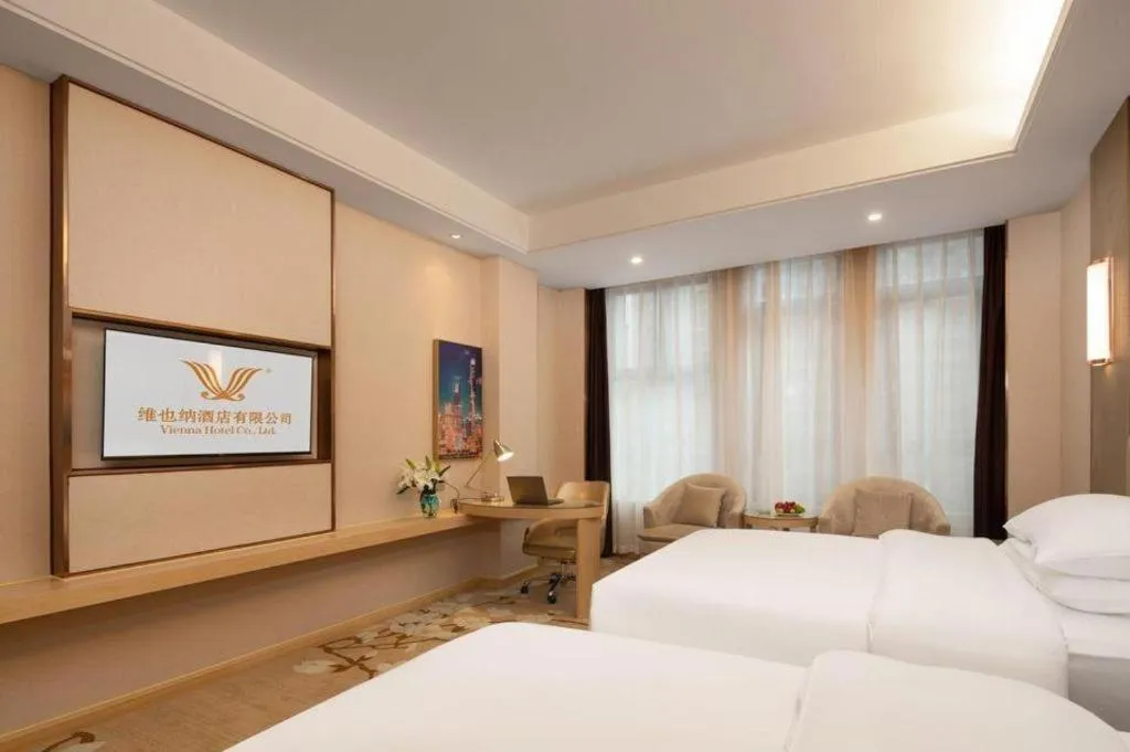 Bed in Vienna Hotel Chongqing Fengdu