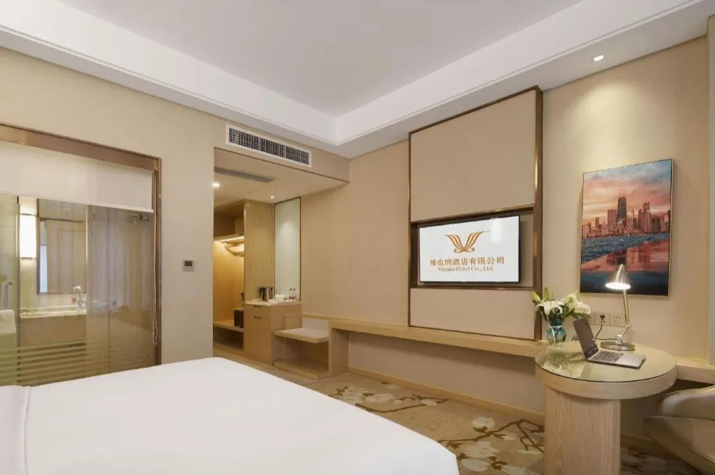 Bed in Vienna Hotel Chongqing Fengdu