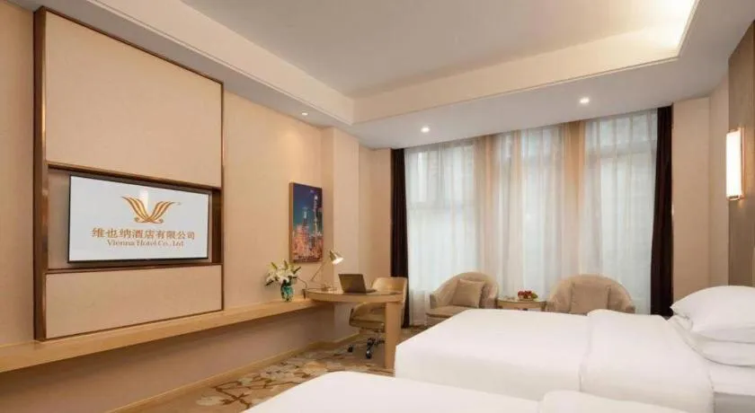 Bed in Vienna Hotel Chongqing Fengdu