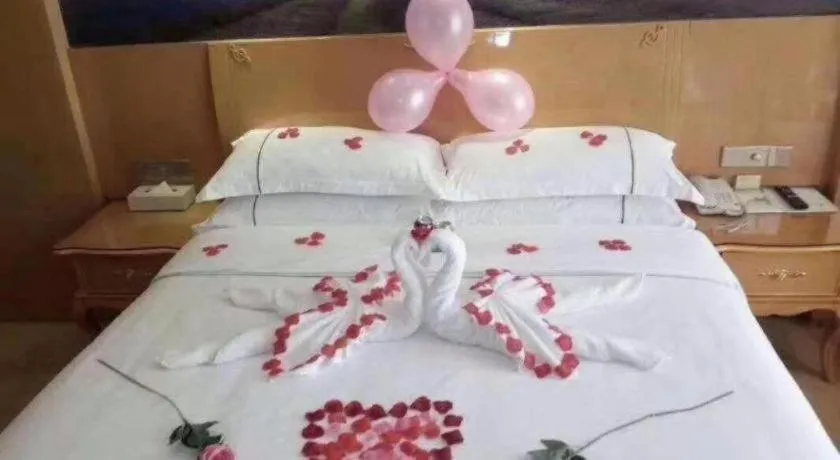 Bed in Vienna Hotel Chongqing Fengdu