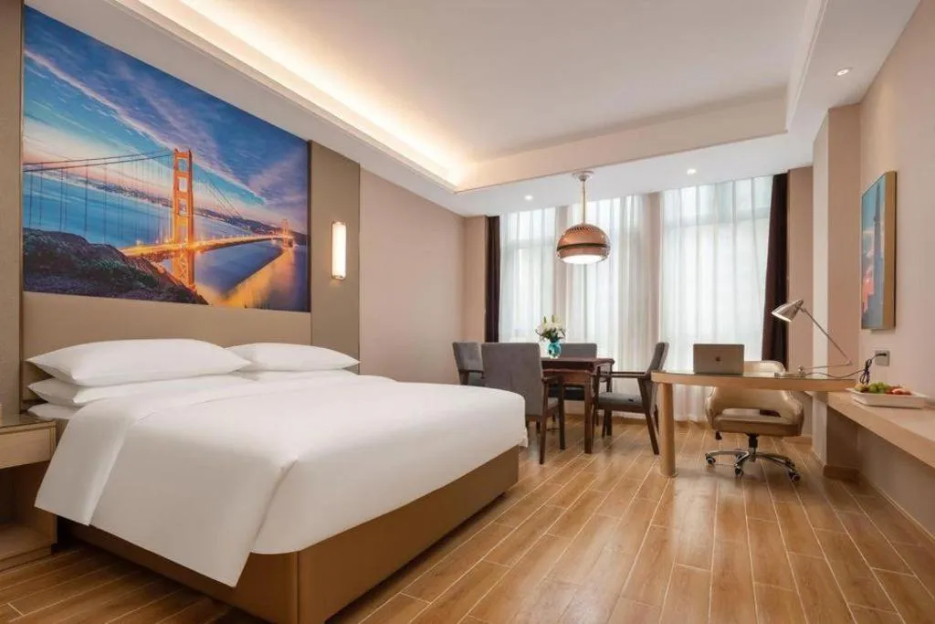 Bed in Vienna Hotel Chongqing Fengdu