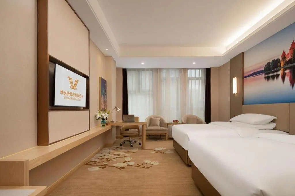 Bed in Vienna Hotel Chongqing Fengdu