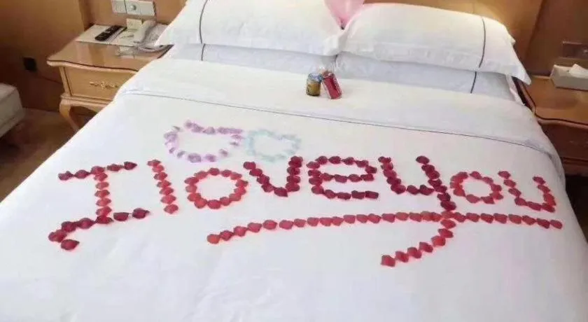 Bed in Vienna Hotel Chongqing Fengdu