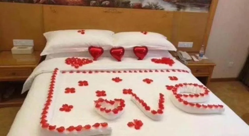 Bed in Vienna Hotel Chongqing Fengdu